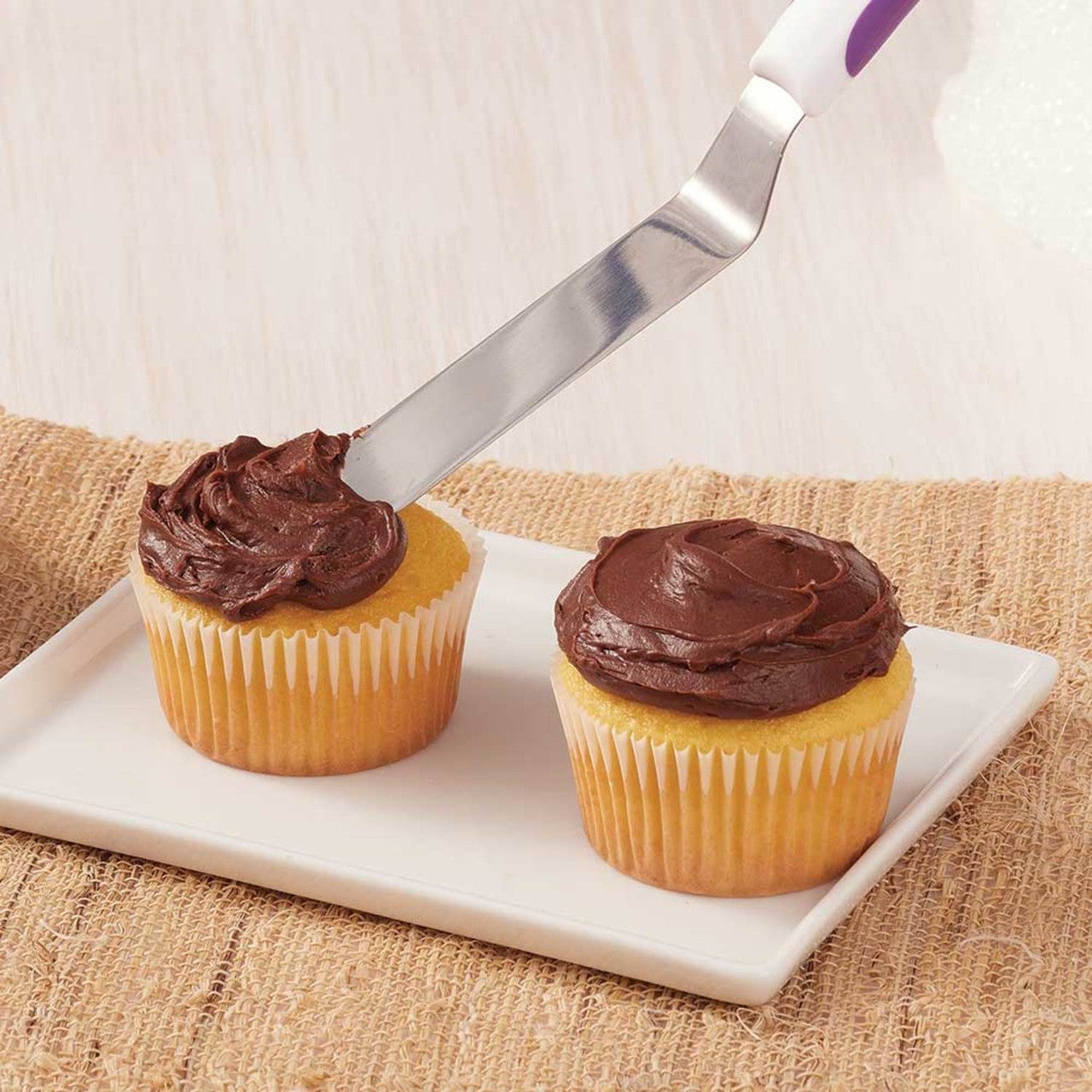 Hvordan dekorere cupcakes med spatula
