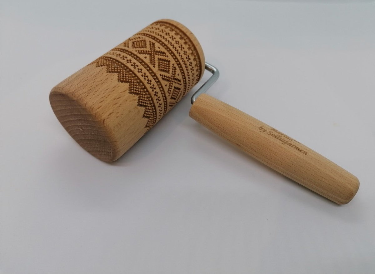 Kjevle tre etthånds preger Mariusmønster